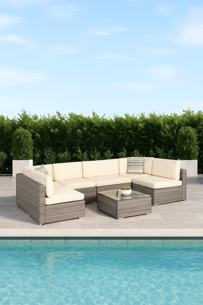 Acheter un salon de jardin en rotin tressé modulable, avec table basse à plateau en verre et coussins épais – disponible en plusieurs teintes de rotin et de tissu, pour s’adapter à tous les extérieurs.